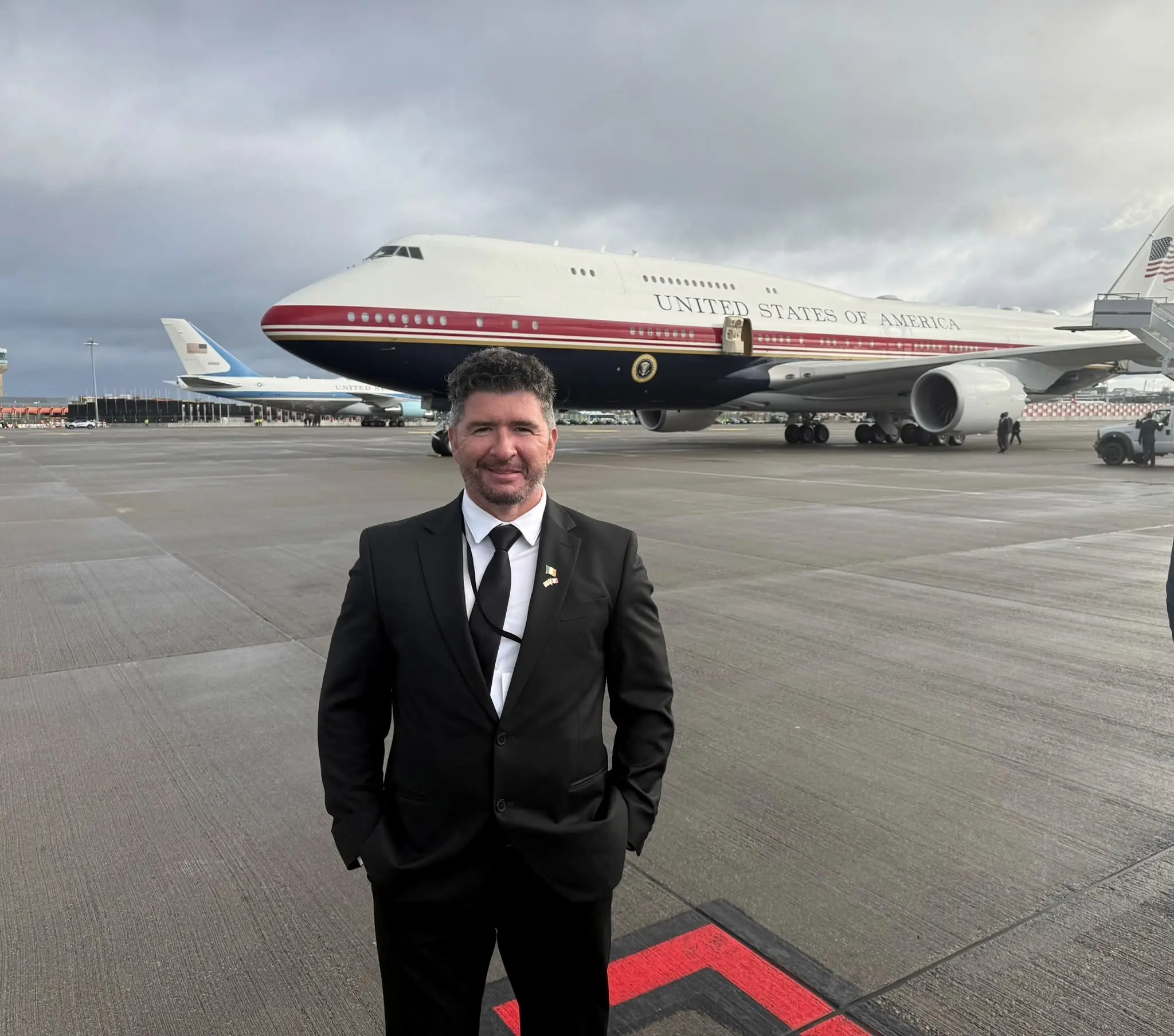 Catalin, IrishDriven's owner and chauffeur, at Dublin Airport with the US Presidential aircraft behind him