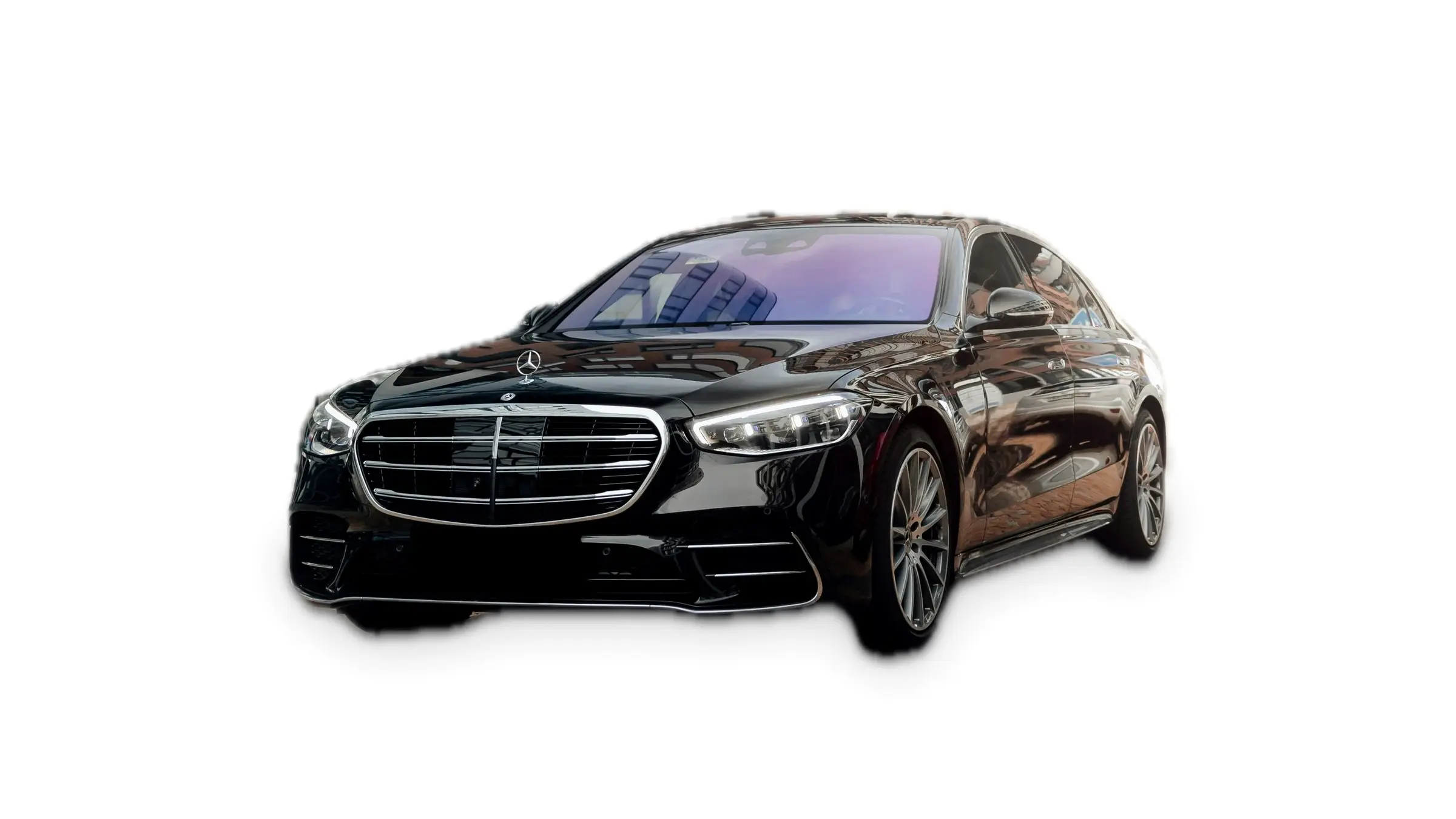 A black Mercedes-Benz S-Class saloon
